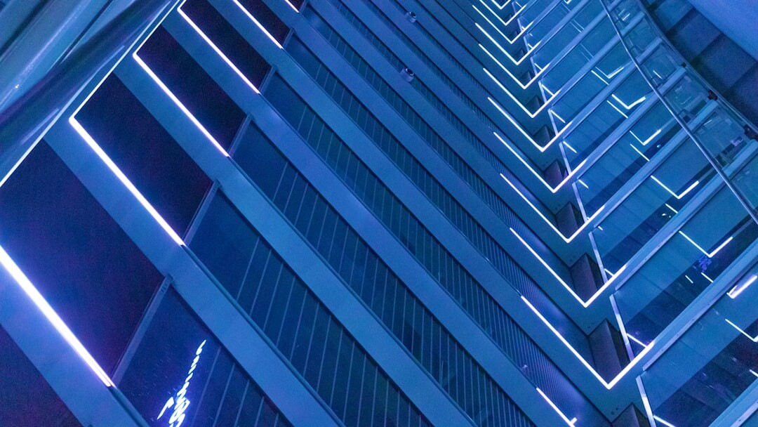 Modern data center server racks with blue lighting